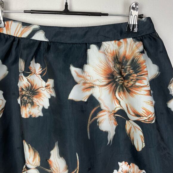 The Moon | NWT Pretty Little Thing Black Chiffon White Floral A-line Mini Skirt - Picture 2 of 8